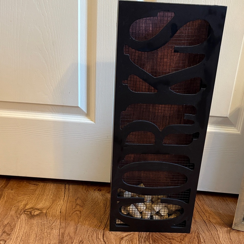 Black Wall Decor with Cutout Design